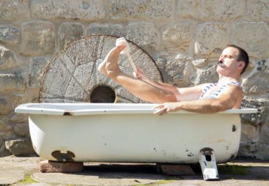 math in a bath washing his feet