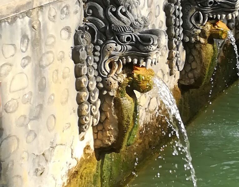 Barong carved faucets at Banjar Hot Springs in Bali