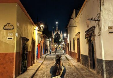 Looking down an evening alley in SMA with the Best Hoka shoes for Travel