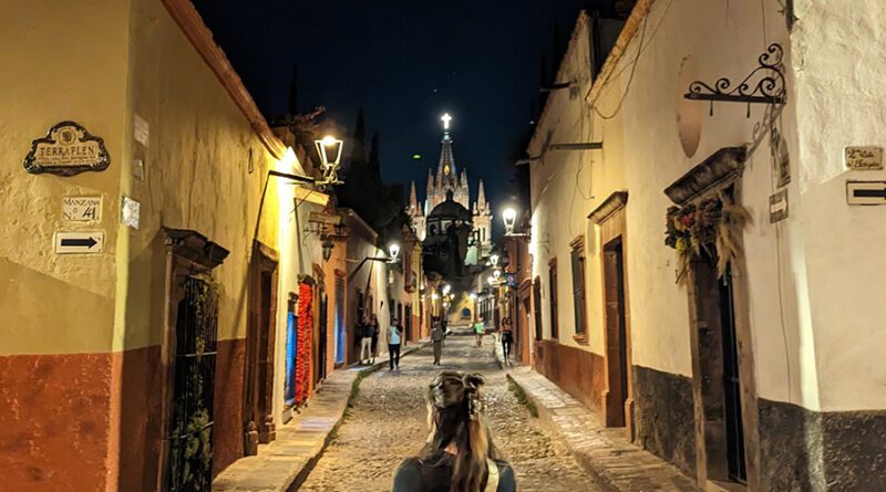 Looking down an evening alley in SMA with the Best Hoka shoes for Travel